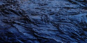 Film still of water from EMERGENCE: a reflection